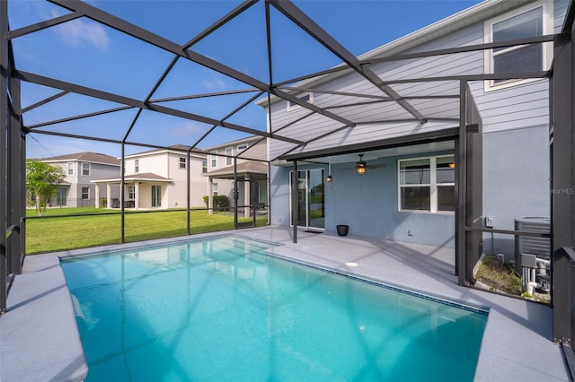 3943 Crawley Down Loop, Sanford, FL 32773 - swimming pool with a patio, a yard, ceiling fan, a lanai, and central air condition unit