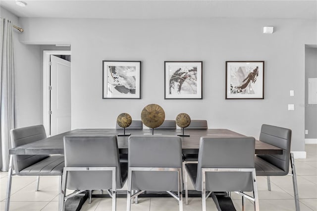 7740 Sandy Ridge Dr Unit 124, Reunion, FL 34747 - dining room featuring light tile patterned flooring
