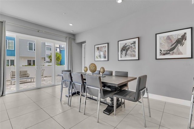 7740 Sandy Ridge Dr Unit 124, Reunion, FL 34747 - dining room with recessed lighting, baseboards, and light tile patterned floors