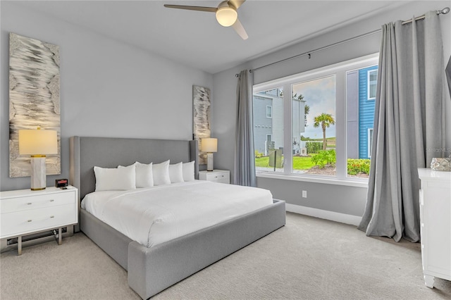 7740 Sandy Ridge Dr Unit 124, Reunion, FL 34747 - bedroom featuring carpet, baseboards, and ceiling fan