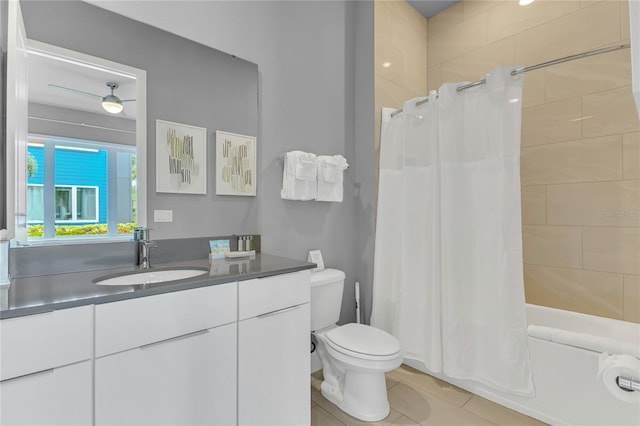 7740 Sandy Ridge Dr Unit 124, Reunion, FL 34747 - full bath featuring tile patterned floors, toilet, vanity, and shower / bath combo with shower curtain