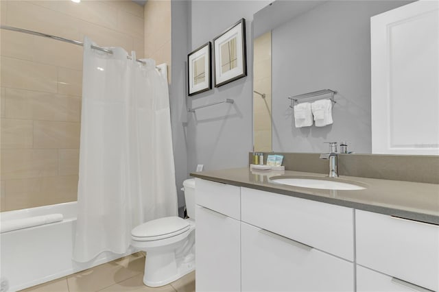 7740 Sandy Ridge Dr Unit 124, Reunion, FL 34747 - full bathroom with toilet, vanity, tile patterned floors, and shower / bathtub combination with curtain