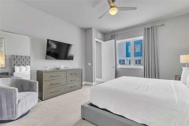 7740 Sandy Ridge Dr Unit 124, Reunion, FL 34747 - bedroom with carpet, ceiling fan, and baseboards