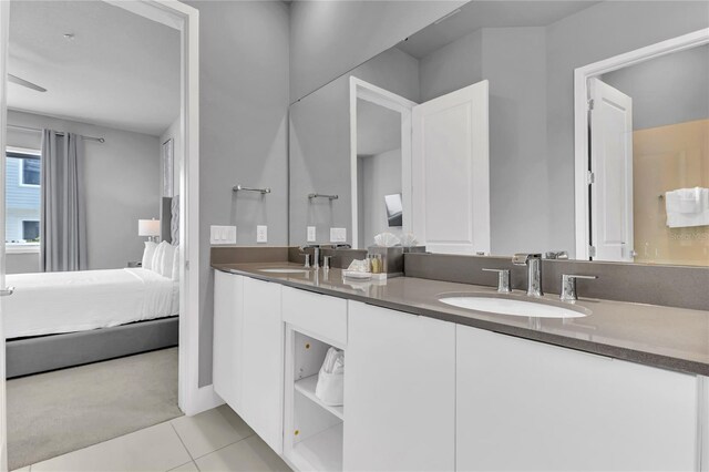 7740 Sandy Ridge Dr Unit 124, Reunion, FL 34747 - ensuite bathroom featuring double vanity and tile patterned floors