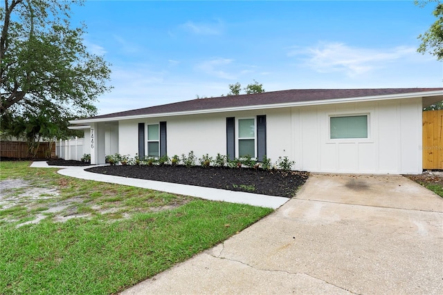 7446 Houston Ct E, Winter Park, FL 32792 - single story home featuring board and batten siding and roof with shingles