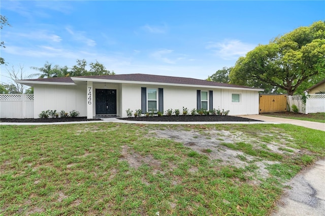 7446 Houston Ct E, Winter Park, FL 32792 - single story home featuring a gate