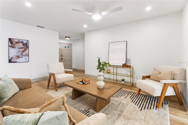 7446 Houston Ct E, Winter Park, FL 32792 - living room with recessed lighting, light wood finished floors, baseboards, and a ceiling fan