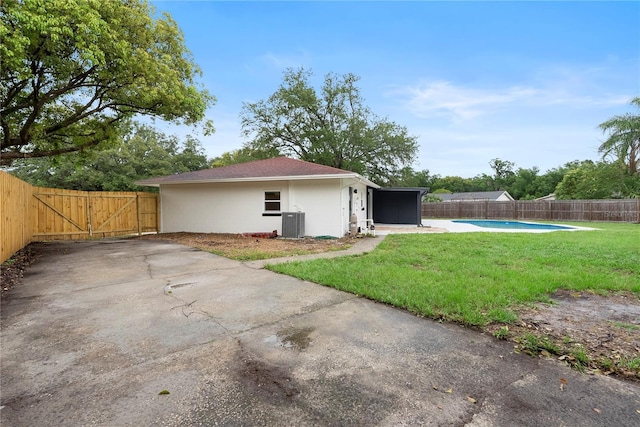 7446 Houston Ct E, Winter Park, FL 32792 - view of yard with a gate and central air condition unit