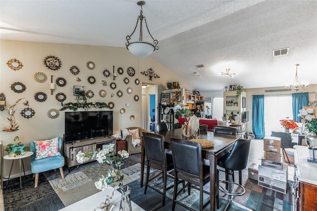 1907 Myakka Ct, Poinciana, FL 34759 - dining room with vaulted ceiling and a chandelier