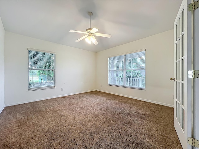 36730 Oconee Ave, Eustis, FL 32736 - carpeted empty room with healthy amount of natural light and a ceiling fan