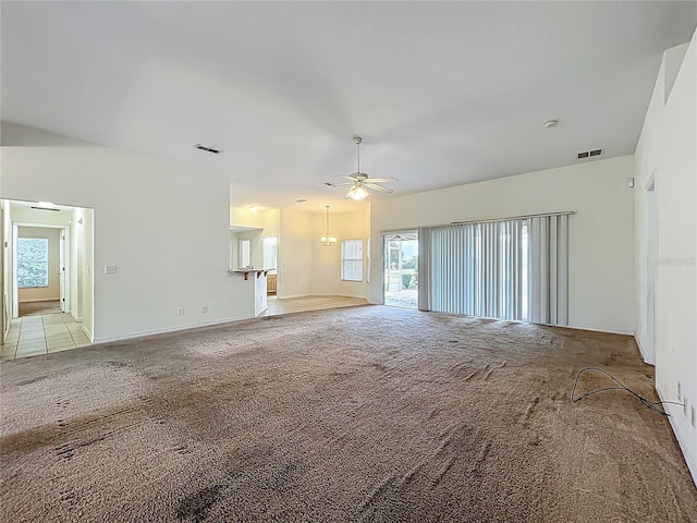 36730 Oconee Ave, Eustis, FL 32736 - unfurnished living room featuring carpet floors and ceiling fan