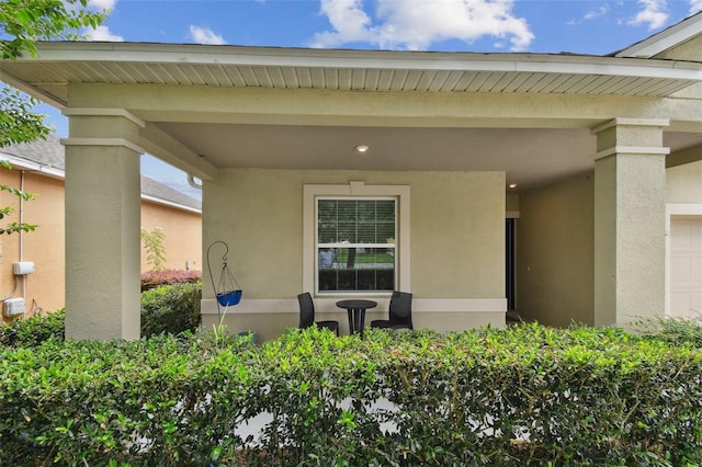 2409 Martins Run, Tavares, FL 32778 - property entrance featuring stucco siding