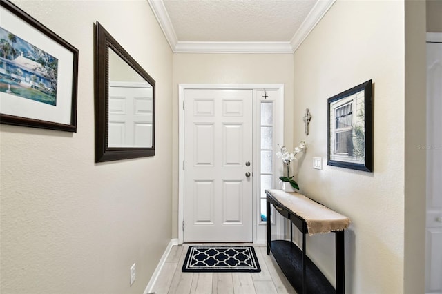 2409 Martins Run, Tavares, FL 32778 - foyer featuring ornamental molding, light wood finished floors, and a textured ceiling