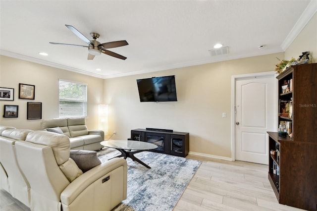 2409 Martins Run, Tavares, FL 32778 - living room with ceiling fan, ornamental molding, light wood-style flooring, and recessed lighting