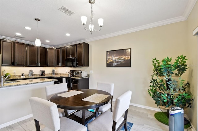 2409 Martins Run, Tavares, FL 32778 - dining area with crown molding, recessed lighting, and a chandelier