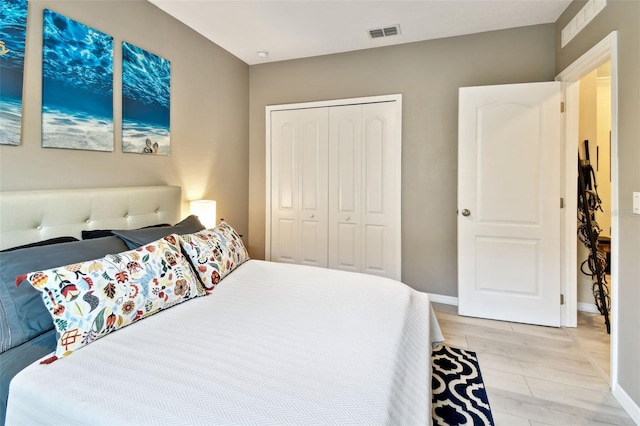 2409 Martins Run, Tavares, FL 32778 - bedroom with a closet and light wood-style floors