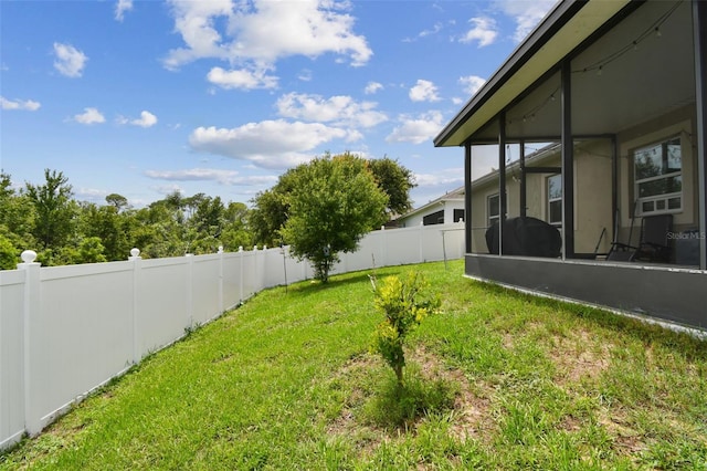 2409 Martins Run, Tavares, FL 32778 - fenced backyard featuring a sunroom