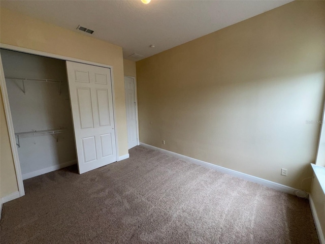 14508 Cedar Branch Way, Orlando, FL 32824 - unfurnished bedroom with carpet floors, a closet, and baseboards