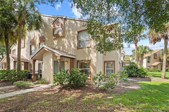 5436 E Michigan St Unit 7, Orlando, FL 32812 - multi unit property with a front lawn and stucco siding