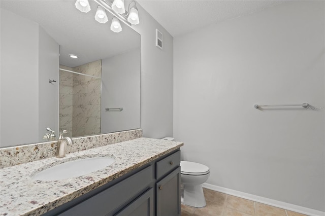 5436 E Michigan St Unit 7, Orlando, FL 32812 - full bathroom featuring vanity, a tile shower, and tile patterned floors