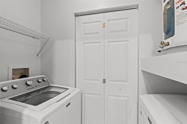 5436 E Michigan St Unit 7, Orlando, FL 32812 - laundry area with washer and dryer