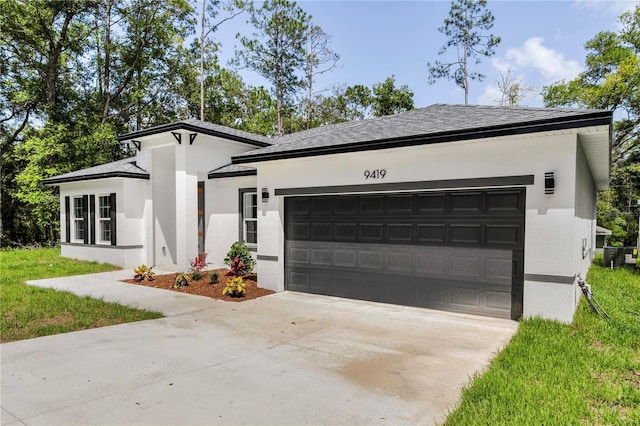 9419 N Jackson Way, Citrus Springs, FL 34434 - view of front facade with stucco siding, driveway, a garage, and roof with shingles