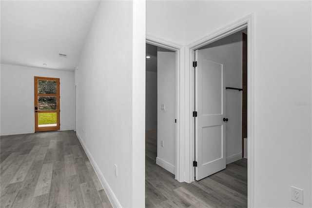 9419 N Jackson Way, Citrus Springs, FL 34434 - corridor with light wood-type flooring and baseboards