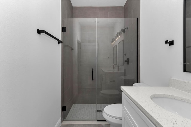 9419 N Jackson Way, Citrus Springs, FL 34434 - bathroom with vanity, toilet, and a stall shower
