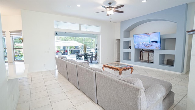 19951 Quinlan St, Orlando, FL 32833 - living room with light tile patterned floors, ceiling fan, recessed lighting, and built in features