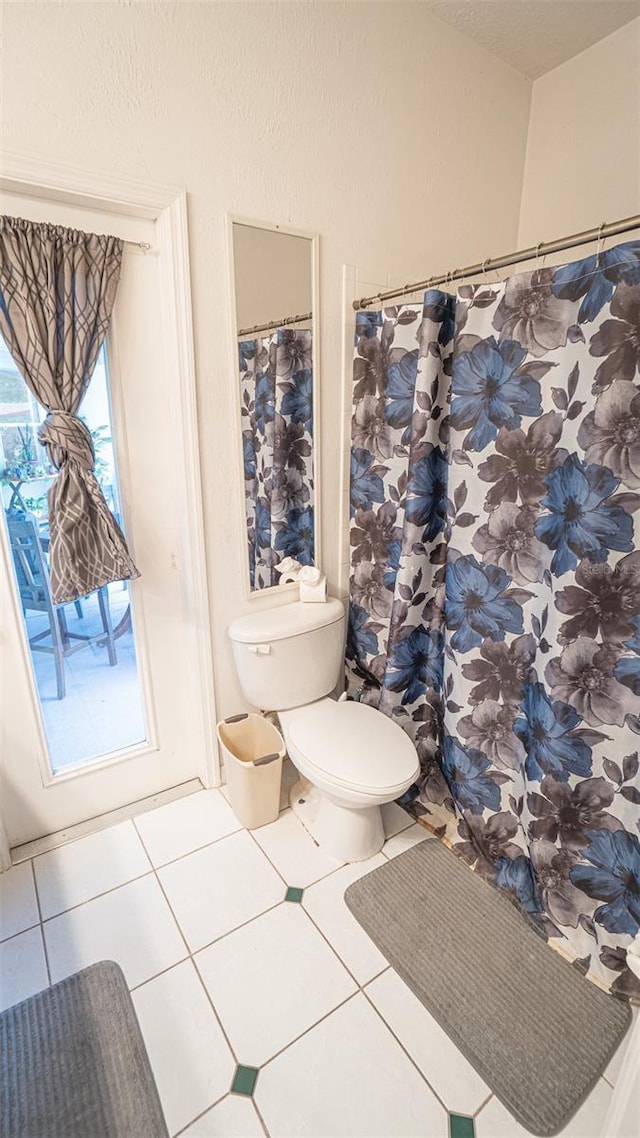 19951 Quinlan St, Orlando, FL 32833 - bathroom featuring tile patterned flooring and toilet