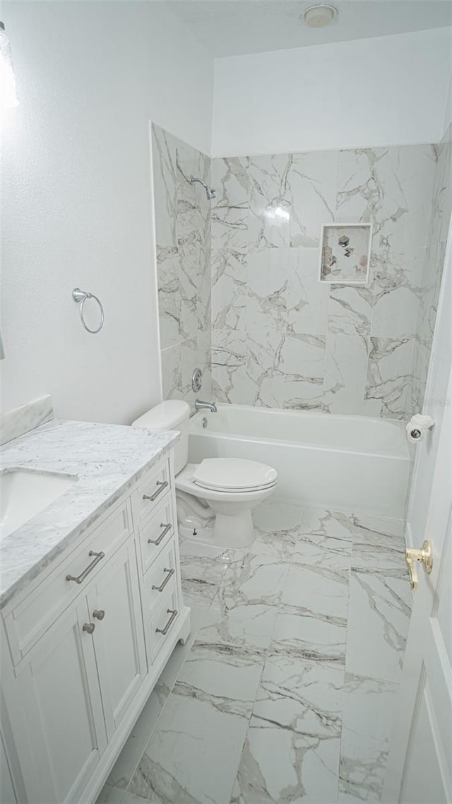 19951 Quinlan St, Orlando, FL 32833 - full bathroom with vanity, shower / tub combination, and marble finish flooring