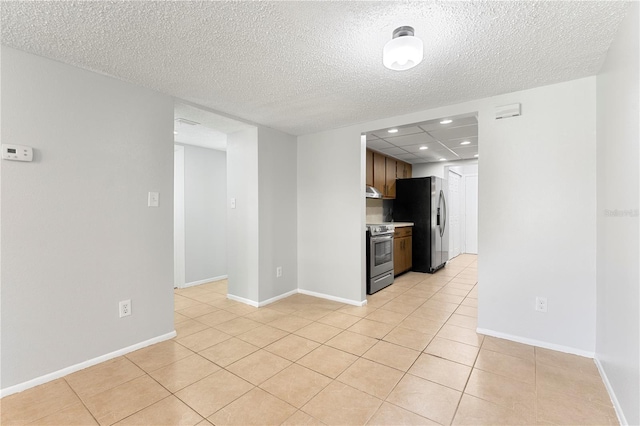 818 Park Lake Cir Unit 10, Maitland, FL 32751 - unfurnished living room with light tile patterned flooring, recessed lighting, and a textured ceiling