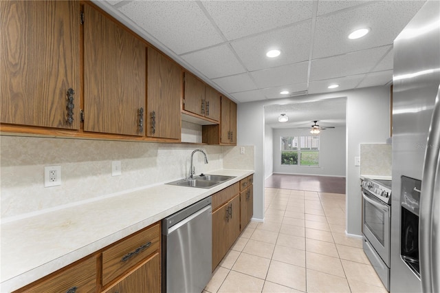818 Park Lake Cir Unit 10, Maitland, FL 32751 - kitchen featuring appliances with stainless steel finishes, light countertops, recessed lighting, light tile patterned floors, and tasteful backsplash