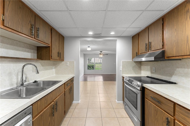 818 Park Lake Cir Unit 10, Maitland, FL 32751 - kitchen featuring appliances with stainless steel finishes, under cabinet range hood, backsplash, light countertops, and recessed lighting