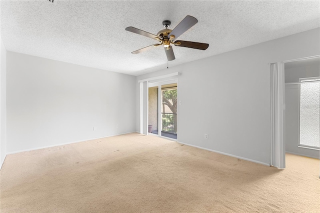 818 Park Lake Cir Unit 10, Maitland, FL 32751 - empty room featuring carpet floors, a ceiling fan, and a textured ceiling