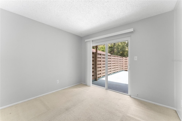 818 Park Lake Cir Unit 10, Maitland, FL 32751 - unfurnished room with carpet and a textured ceiling