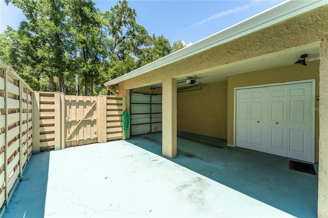 818 Park Lake Cir Unit 10, Maitland, FL 32751 - view of patio with a gate and a garage