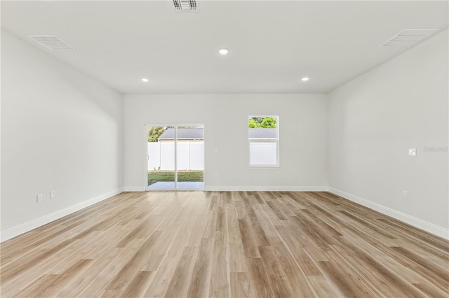 178 Marion Oaks Ln, Ocala, FL 34473 - empty room with light wood-style flooring, baseboards, and recessed lighting