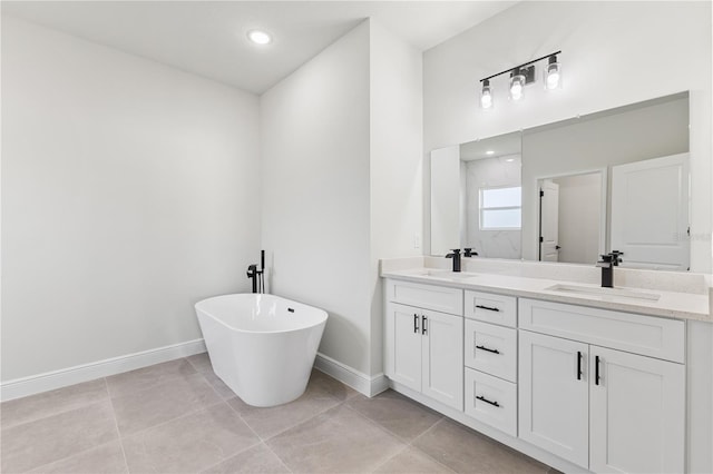 178 Marion Oaks Ln, Ocala, FL 34473 - full bath featuring double vanity, a freestanding bath, baseboards, tile patterned floors, and recessed lighting