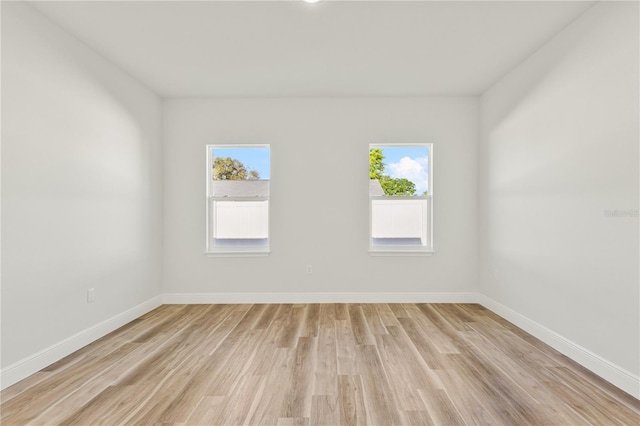178 Marion Oaks Ln, Ocala, FL 34473 - empty room featuring light wood finished floors and baseboards