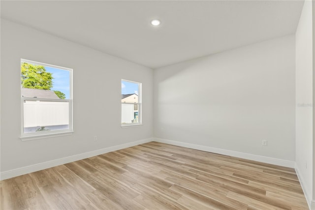 178 Marion Oaks Ln, Ocala, FL 34473 - empty room with light wood-style floors, baseboards, and recessed lighting