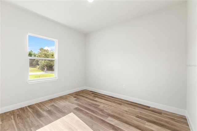178 Marion Oaks Ln, Ocala, FL 34473 - spare room featuring baseboards and light wood-style floors