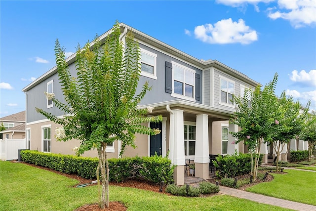 11054 Hanlon Terrace Aly, Winter Garden, FL 34787 - view of front of home with stucco siding and covered porch