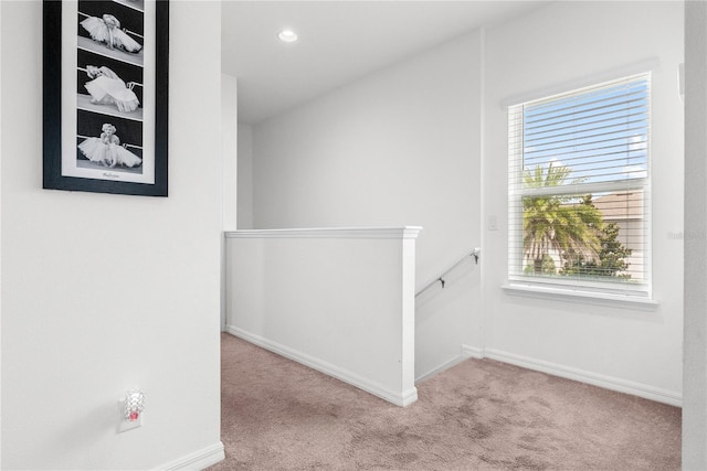 11054 Hanlon Terrace Aly, Winter Garden, FL 34787 - hallway with an upstairs landing, carpet, baseboards, and recessed lighting