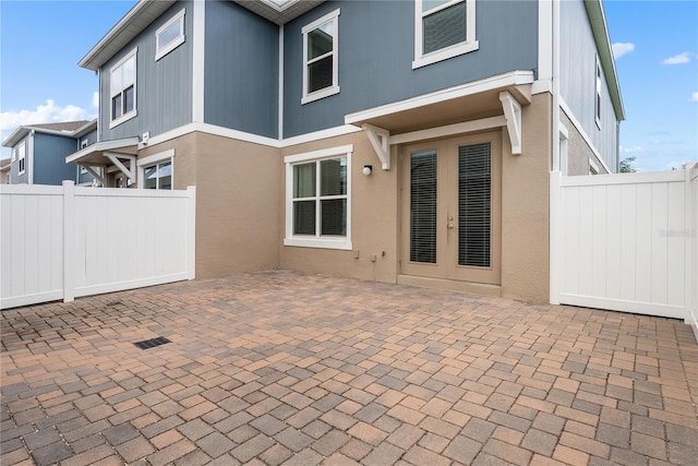 11054 Hanlon Terrace Aly, Winter Garden, FL 34787 - rear view of house with a patio area and stucco siding