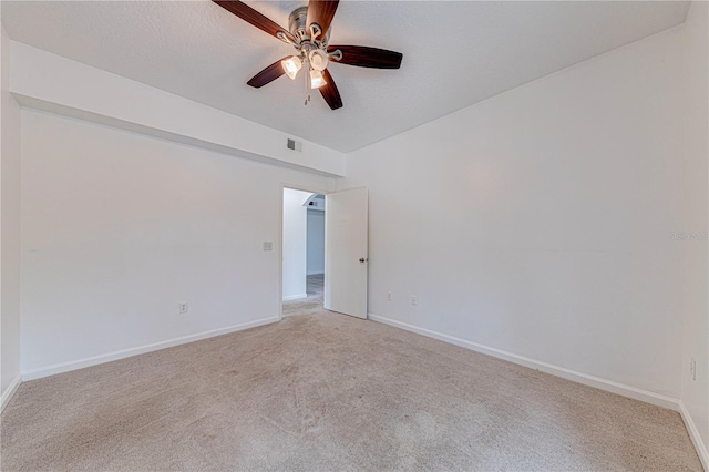 5500 Metrowest Blvd Unit 203, Orlando, FL 32811 - unfurnished room featuring light carpet, ceiling fan, and baseboards
