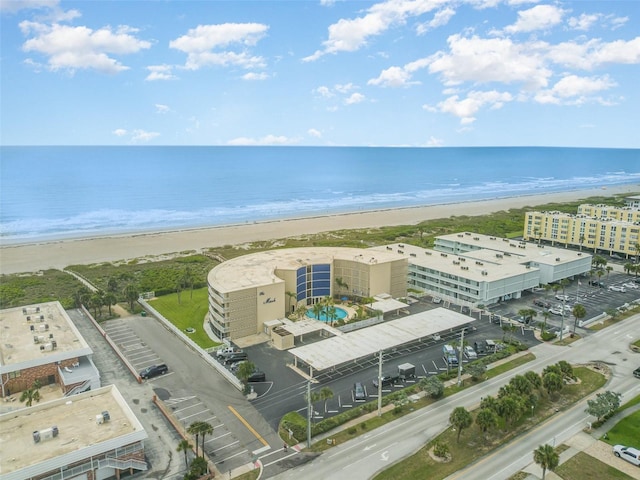 4850 Ocean Beach Blvd Unit 208, Cocoa Beach, FL 32931 - bird's eye view of waterfront with a beach
