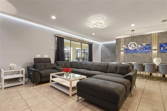 8801 Macapa Dr, Kissimmee, FL 34747 - living area featuring light tile patterned floors and recessed lighting