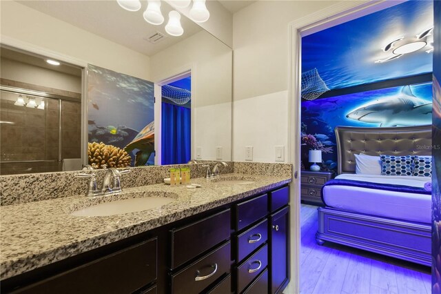 8801 Macapa Dr, Kissimmee, FL 34747 - ensuite bathroom featuring double vanity and a shower stall