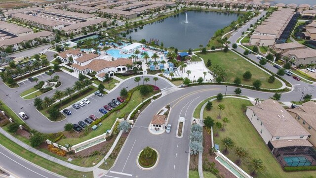 8801 Macapa Dr, Kissimmee, FL 34747 - aerial view of property and surrounding area featuring a large body of water and nearby suburban area